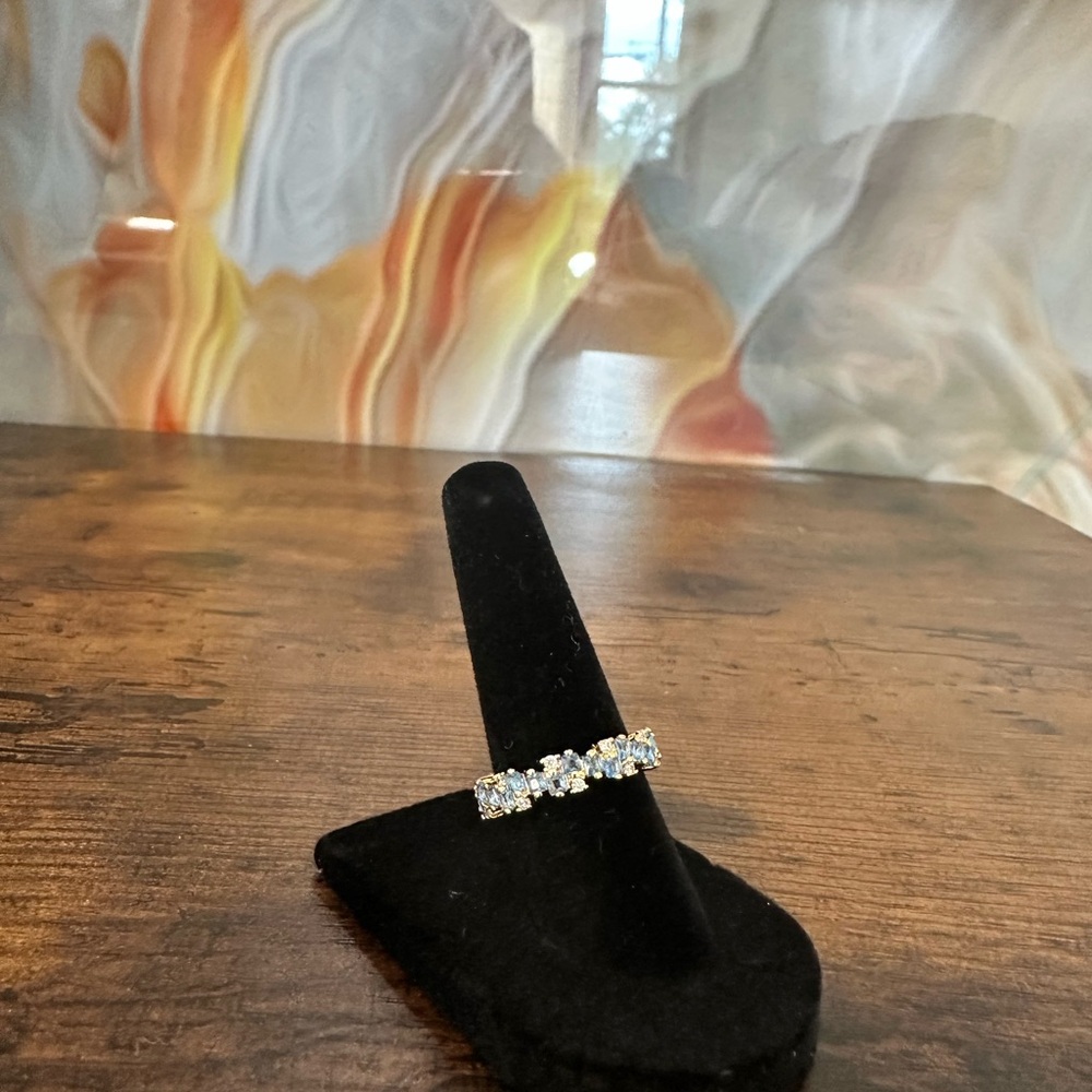 Amazon gold Ring with light blue  Stones